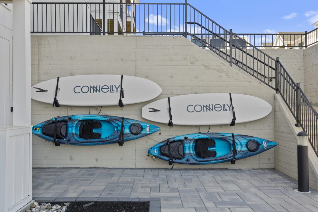 Paddleboards available for residents at Sedna Beverly waterfront apartments in Beverly, MA.